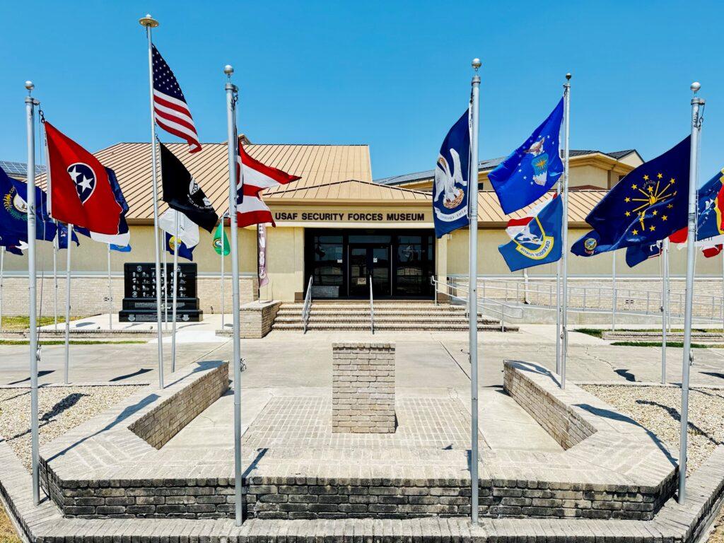 Security Forces Museum building with flags and entrance view